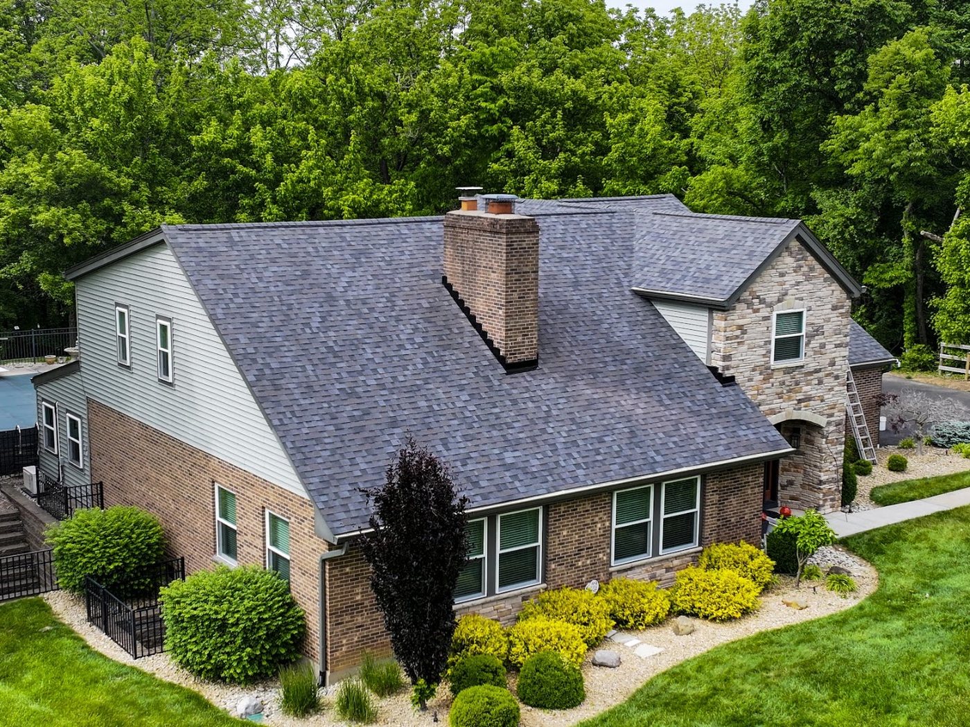 Roof replacement: Brick and stone ranch
